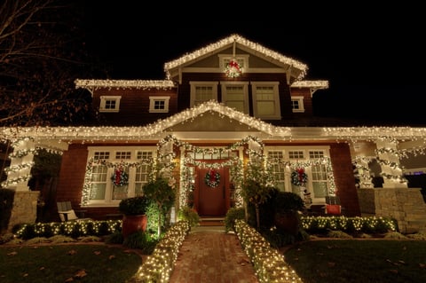 Holiday lights on house roofline