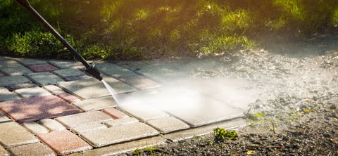 Dirty driveway before pressure washing