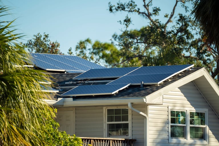 Private home roof covered with solar photovoltaic panels for generating clean electric energy