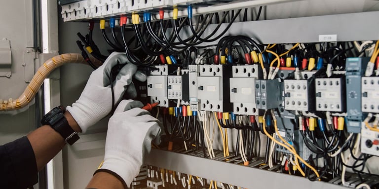 Electrician testing electrical installations